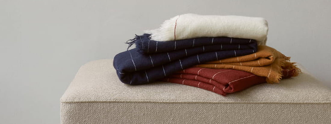 De wollen deken Battus uit de Cocoon collectie van Menu is geweven van Italiaanse wol. Dit wordt gemengd met zijde om een bijzonder zacht gevoel te creëren.