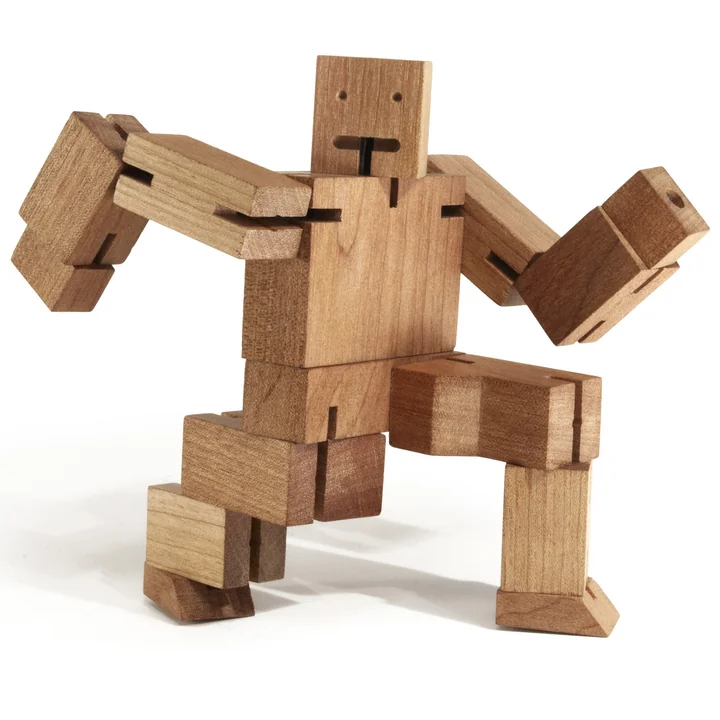 De Cubebot van Areaware in de knielende