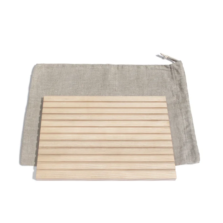 Broodsnijplank en broodzak, as door side by side