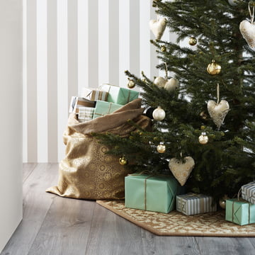 Kerstboomtapijt en kersttas van Juna met cadeaus