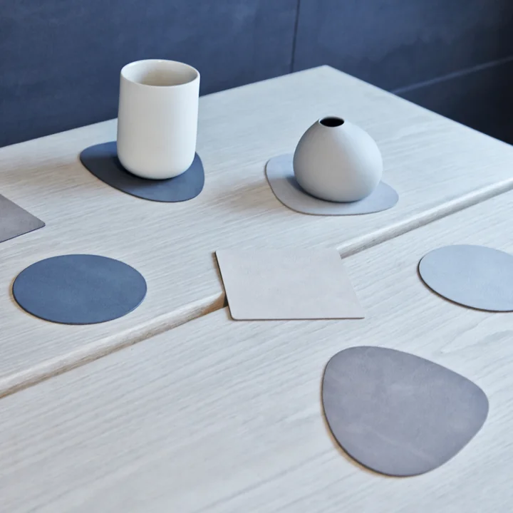 Glazen onderzetters van Lind DNA