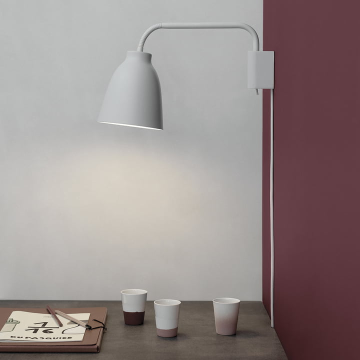 Caravaggio wandlamp gelezen door Fritz Hansen