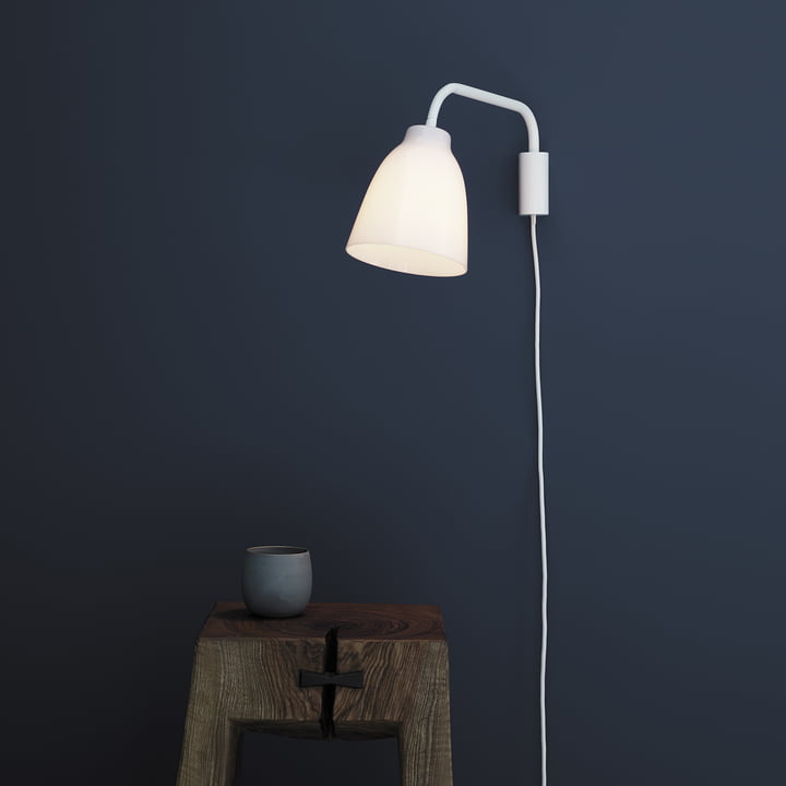 Caravaggio wandlamp gelezen door Fritz Hansen