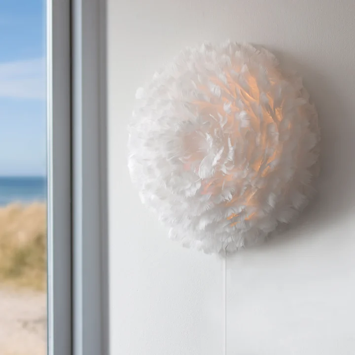 Eos Up Plafond- en wandlamp van Umage in créme aan de muur