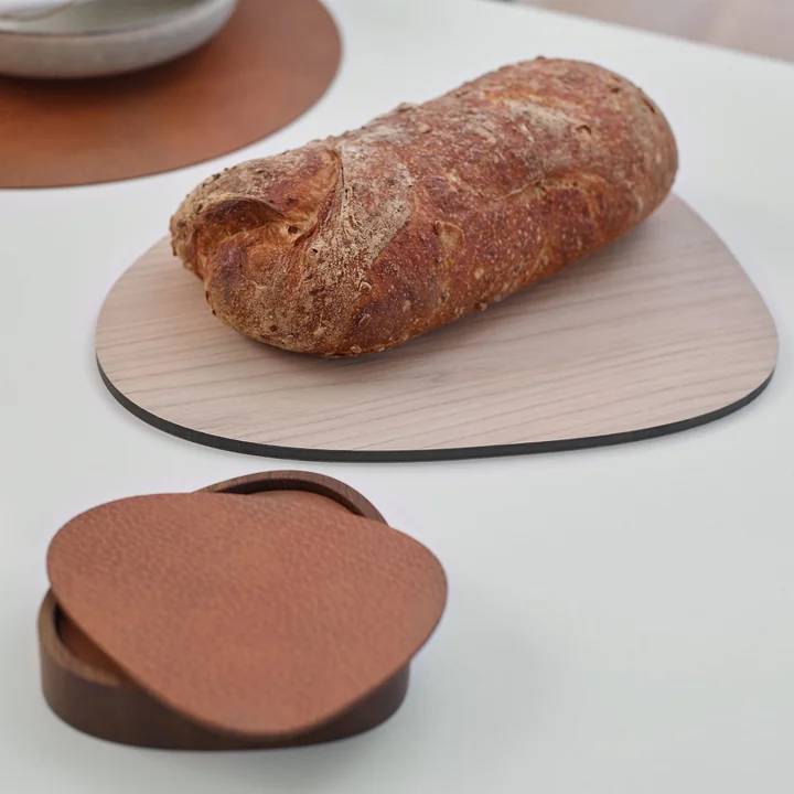 Snijplank&en glazen onderzetters van Lind DNA