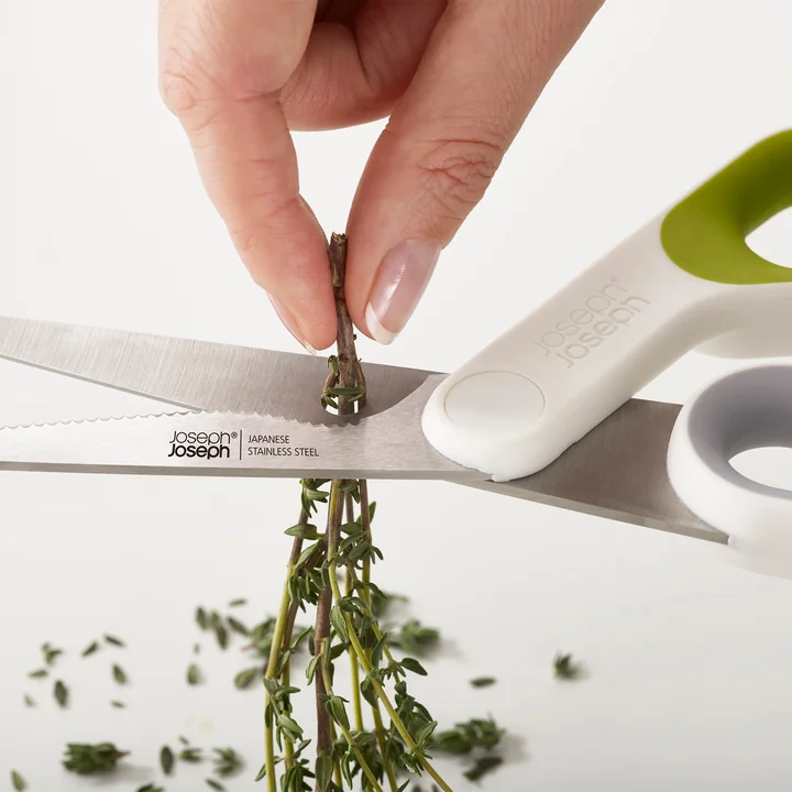 Powergrip keukenschaar van Joseph Joseph Joseph in wit/groen