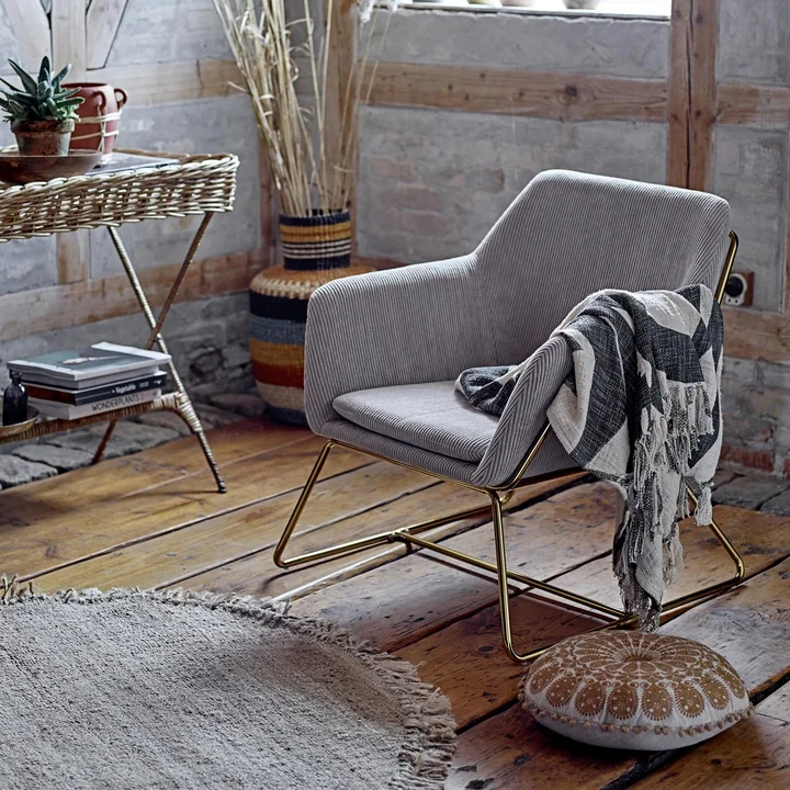 Natuurvezeltapijt met franjes Ø 150 cm van Bloomingville, gemaakt van jute.