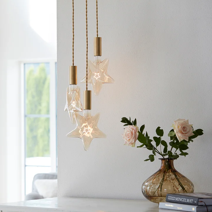 LED Star, E 27 / 0,75 W, goud amber, dimbaar van NUD Collection