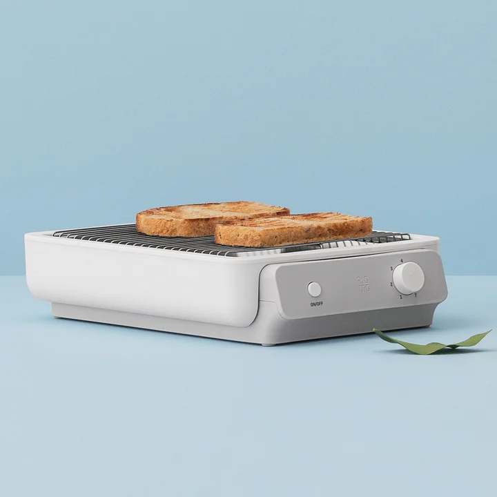 De Foodie platte broodrooster van Rig-Tig by Stelton in wit met twee sneetjes toast