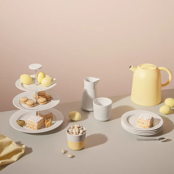 De Thimble isoleerkan en de Caffè Lungo mok van Eva Solo in het nieuwe Lemon -geel.