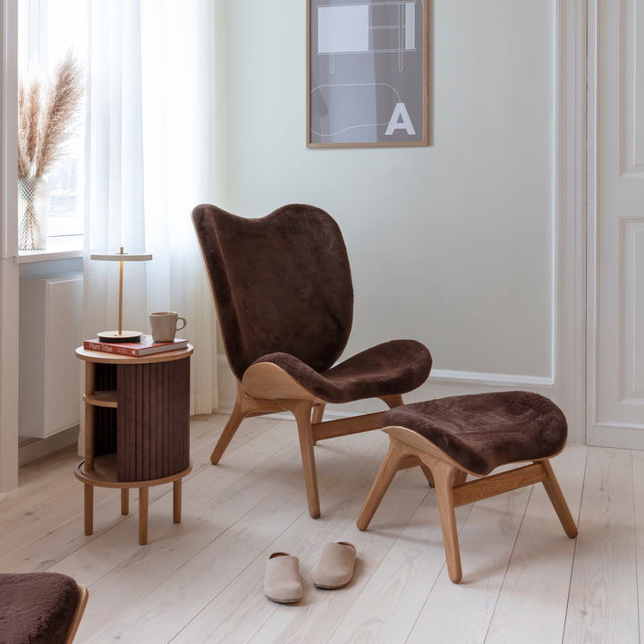 Een Conversation Piece Hoge fauteuil en voetenbank van Umage