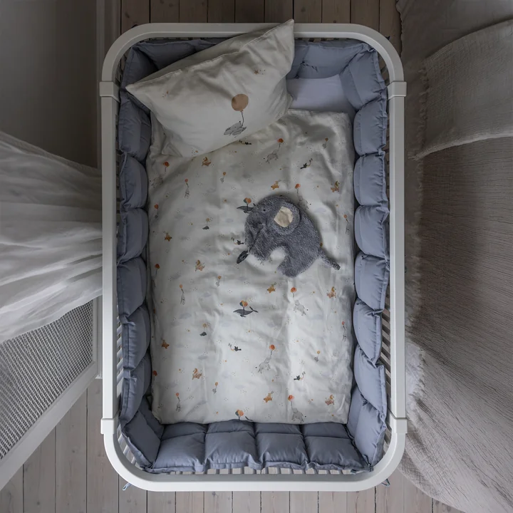 Sebra - Baby ledikantbumper, gewatteerd / stoffig blauw